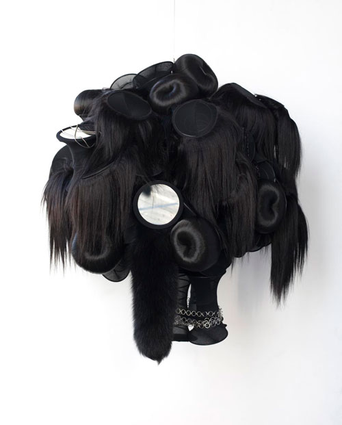 Nina Lola Bachhuber. Untitled, 2008. Coil springs, tights, hair, fox tail, mirrors, necklaces, 71 x 76.2 x 88 cm.