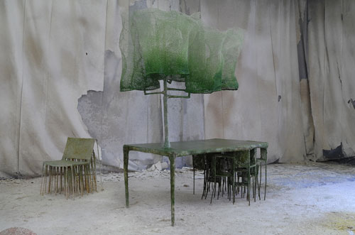 Nacho Carbonell. Archival Table, 2014. Metal structure, metal mesh, few spray layers of textile hardener, paper, pigments and yuta, table 246 x 108 x 200 cm; chair 83 x 72 x 60 cm. Photograph: Tathiana Uzlova.