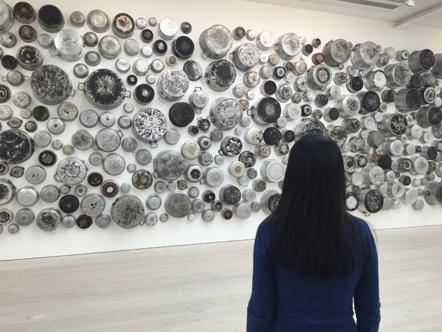 Maha Malluh. Untitled (Food for Thought series), 2015. 233 burnt pots, 4.40 x 10 m. Photograph: Martin Kennedy.