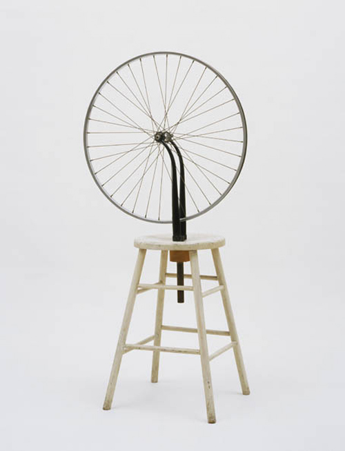 Marcel Duchamp, American, born France 1887-1968. <em>Bicycle Wheel (Roue de bicyclette)</em>, New York, 1951 (third version, after lost original of 1913). 
Metal wheel mounted on painted wooden stool, 128.3 x 63.8 x 42 cm. The Museum of Modern Art, New York. The Sidney and Harriet Janis Collection, 1967
 © 2006 Marcel Duchamp/Artists Rights Society (ARS), New York/ADAGP, Paris/Succession Marcel Duchamp.
