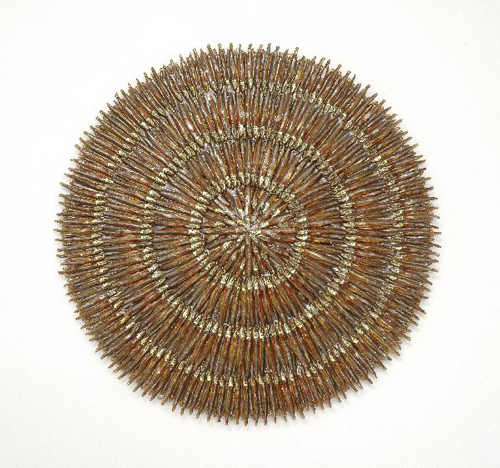 Tracy Heneberger. <em>Moon</em>, 2006. Anchovies, epoxy, shellac, resin, 24 x 24 x 1½ inches (61 x 61 x 3.8 cm). Courtesy of the artist. Photo: Tony Holmes.
