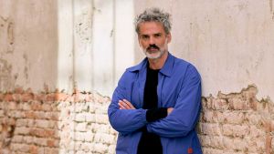 The artist talks about A Place in the Sun, his twisty, challenging video installation at the Albanian Pavilion and why he based it on a re-enactment of an absurdist theatre from a century ago, using an obscure language that no one understands