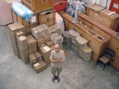 Cildo Meireles surrounded by the boxes which contain the first version of the

Red Shift.