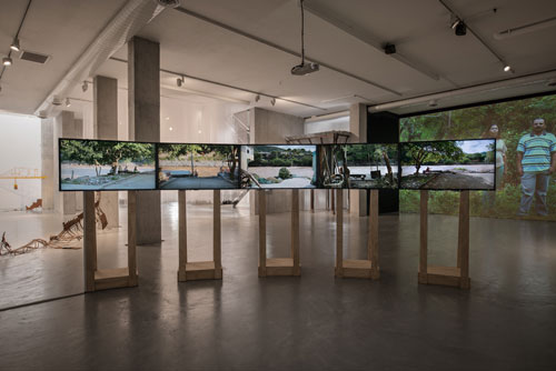 Nicolás Consuegra (b1976). El agua que tocas es la última que ha pasado y la primera que viene (The water that you touch is the last of what has passed and the first of that which comes), 2013. Multi-channel video installation. View of exhibition, LARA 2012. NC-arte, Bogota. Courtesy of the artist.