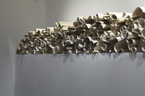 Carol Young (b1952). Memoria (Memory), 2013. Ceramic installation of 130 elements. Courtesy of the artist.