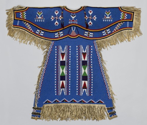 Woman’s Dress, c1900. Dakota (Eastern Sioux), Yanktonai or Lakota (Teton Sioux) artist, Fort Peck Reservation (Montana) Native tanned leather, glass, brass and steel-cut beads, metal cones, horsehair. 48 x 39 in (121.9 x 99.1 cm). Washington (District of Columbia), Smithsonian Institution, National Museum of Natural History, Department of Anthropology. Photograph: National Museum of Natural History, Smithsonian Institution, Department of Anthropology. (Cat.109).