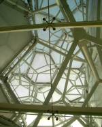 Close-up view of the ETFE roof cavity, exposing the molecule-like structural framing around which the EFTE fabric is stretched on.