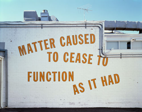 Lawrence Weiner. <em>MATTER CAUSED TO CEASE TO FUNCTION AS IT HAD</em>, 1995. Language and the materials referred to, dimensions variable. Installation view, Regen Projects, Los Angeles, 1995. Courtesy Regen Projects, Los Angeles. Copyright © Lawrence Weiner.