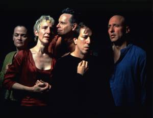 Bill Viola. <em>The Quintet of the Unseen</em>, 2000 (production still). 
        Video installation, colour video rear projection on screen mounted

        on wall. 
        Projected image size: 140 x 240 cm. 
      Photo: Kira Perov