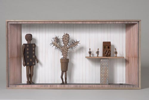 Andràs Böröcz. <em>Dominoes at the Watermill</em>, 2006. Carved pencils, mixed media construction 12 x 24 x 4 in. Courtesy Adam Baumgold Gallery.