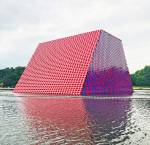 Christo. The London Mastaba, Serpentine Lake, Hyde Park, 2016-18. Temporary floating sculpture, 7,506 horizontally stacked barrels on a floating platform, 20(h) x 30(w)x 40(l) m, 600 metric tonnes. Photo: Martin Kennedy.