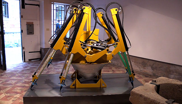 James Capper. Six Step, 2015. Powder coated steel, aluminium belly, hydraulic system with six step-type teeth, 200 x 200 x 200 cm. Installation view, Venice Biennale, 2015. Photograph: Martin Kennedy.