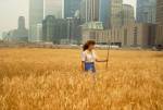 Agnes Denes, Wheatfield – A Confrontation: Battery Park Landfill, Downtown Manhattan – With Agnes Denes Standing in the Field, 1982. © Agnes Denes, courtesy Leslie Tonkonow Artworks + Projects, New York.