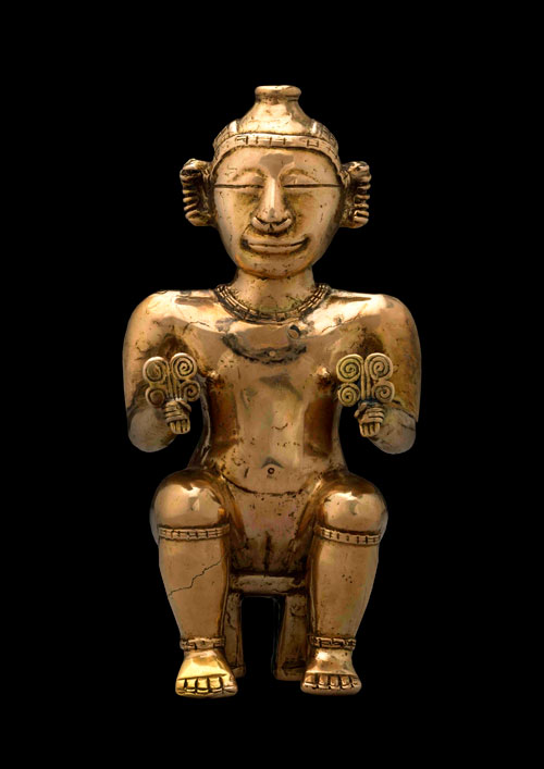 Seated female poporo, Quimbaya, gold alloy, AD600-1100. Copyright the Trustees of the British Museum.