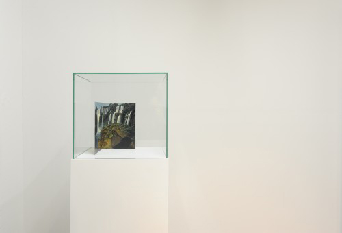Haris Epaminonda. 'Untitled #06 m/g (waterfall II)’, 2009. Standing book page, glass, plinth, dimensions variable. Courtesy the artist and Rodeo Istanbul/London.