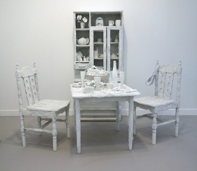 Yayoi Kasuma. Solitude of the Earth, 1994. Mixed Media, table, two chairs and cabinet. 2x chairs: 102 x 45 x 52 cm, Table: 100 x 75 x 77 cm., Cabinet: 177.5 x 82  x 44 cm. Photograph: Miguel Benavides.