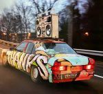 Graffitied car on Wilshire Boulevard, Los Angeles, 2024. Photo: Jill Spalding.