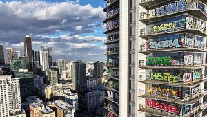 Graffiti! The recent dust-up over three Los Angeles skyscrapers raises the question: defacement or fine art? Follow its history, from marked-up rocks to NFTs, and weigh in