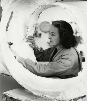 Barbara Hepworth at work on the plaster for Oval Form (Trezion), 1963. Courtesy Bowness. Photograph: Val Wilmer
