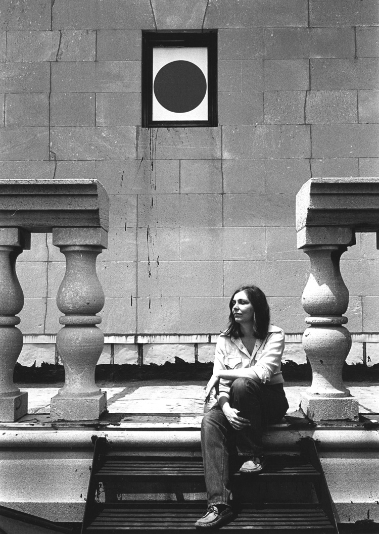 Portrait of Nancy Holt taken on the steps up to the Clocktower Gallery, New York (1974). Photograph: Gwenn Thomas. © Holt/Smithson Foundation, Licensed by VAGA at ARS, New York.
