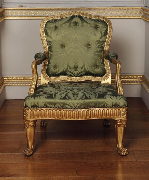 Armchair for the Painted Room, Spencer House, London, 1759-1766. Probably carved by Thomas Vardy. Carved and gilt limewood, silk damask upholstery (not original). © Courtesy of Spencer House and the Trustees of the Victoria and Albert Museum