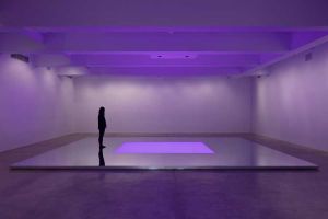 Kimsooja, To Breathe, 2015. Chromatic spectrum projection with mirror platform floor, Gallery installation, 9 x 675 x 900 cm, duration: 10 min, 32 sec. Installation view, Tanya Bonakdar Gallery, New York, 12 April – 14 June 2024. Photo: Pierre Le Hors. Courtesy the artist and Tanya Bonakdar Gallery, New York / Los Angeles.