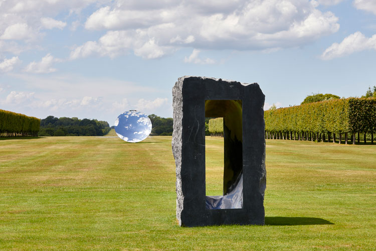 Anish Kapoor. Untitled, 1997, Kilkenny limestone; Sky Mirror, 2018, stainless steel. Courtesy the artist and Lisson Gallery. © Anish Kapoor. All rights reserved DACS, 2020. Photo: Pete Huggins.
