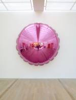 Jeff Koons. Moon (Light Pink), 1995–2000. Mirror-polished stainless steel with transparent color coating, 130 x 130 x 40 in (330.2 x 330.2 x 101.6 cm). Collection of the artist. © Jeff Koons.