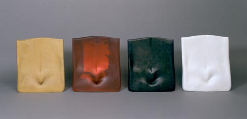 Laura de Santillana. <em>Senza Titolo</em>, 2005. Hand-blown glass with silver foil, wax, cast bronze, and plaster. Overall: 18 7/8 x 17 5/16in. (48 x 44cm) each. Museum of Arts & Design, New York. Museum purchase with funds provided by Frances Alexander Foundation, Bonnie Korn, The Windgate Charitable Foundation and the Collections Committee, 2006. Photo credit: Unknown.