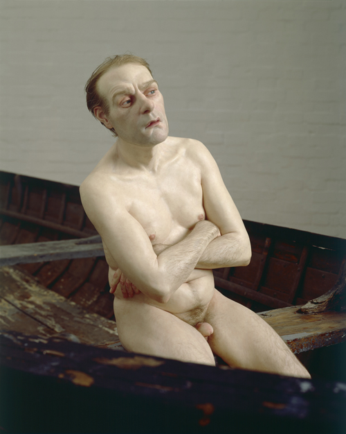 Ron Mueck. <em>Man in a Boat</em>, 2002. Mixed media. Man: (height) 75cm Boat: (length) 427cm © Ron Mueck, courtesy Anthony d'Offay, London. Photographer: Mike Bruce, Gate Studios, London.