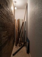 Mike Nelson: Humpty Dumpty, low rise, installation view, Fruitmarket Warehouse, Edinburgh, 2025. Photo: Tom Nolan.