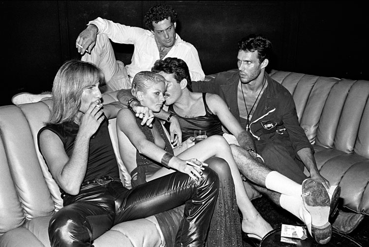 Guests in conversation on a sofa, Studio 54, New York, 1979. © Bill Bernstein, David Hill Gallery, London.