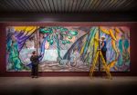 Installation view, Chris Ofili: The Caged Bird's Song, Dovecot Studios, Edinburgh, 2024 featuring The Caged Bird's Song tapestry triptych by Chris Ofili, 2014–2017. © The artist. Courtesy the artist and Victoria Miro, The Clothworkers' Company and Dovecot Tapestry Studio, Edinburgh. Photo: Phil Wilkinson.