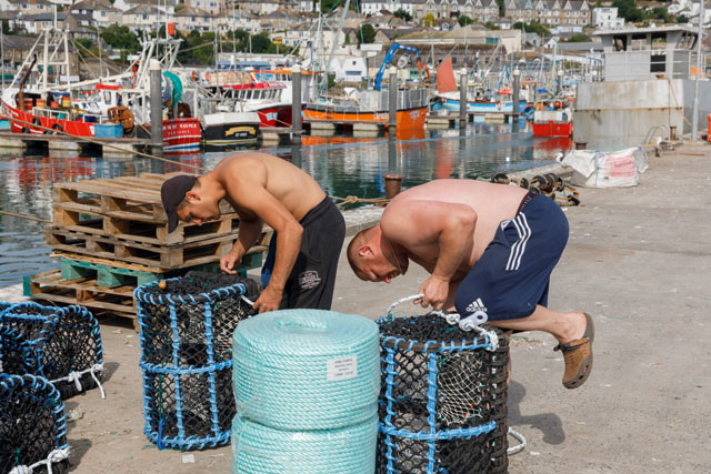 Martin Parr. Preparing lobster pots, Newlyn Harbour, Cornwall, England, 2018. © Martin Parr / Magnum Photos / Rocket Gallery.