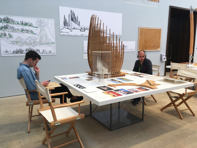 Visitors immersed in content. Installation view, Renzo Piano: The Art of Making Buildings, Royal Academy of Arts, London. Photo: Veronica Simpson.