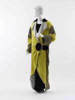 Paul Poiret (French, 1879–1944). Opera Coat, 1912. Yellow and pale blue silk satin, black silk velvet, turquoise silk satin with gold and silver filé crocheted overlay, and silver filé trapunto half-belt and trim. The Metropolitan Museum of Art, Purchase, Irene Lewisohn Bequest, 1982