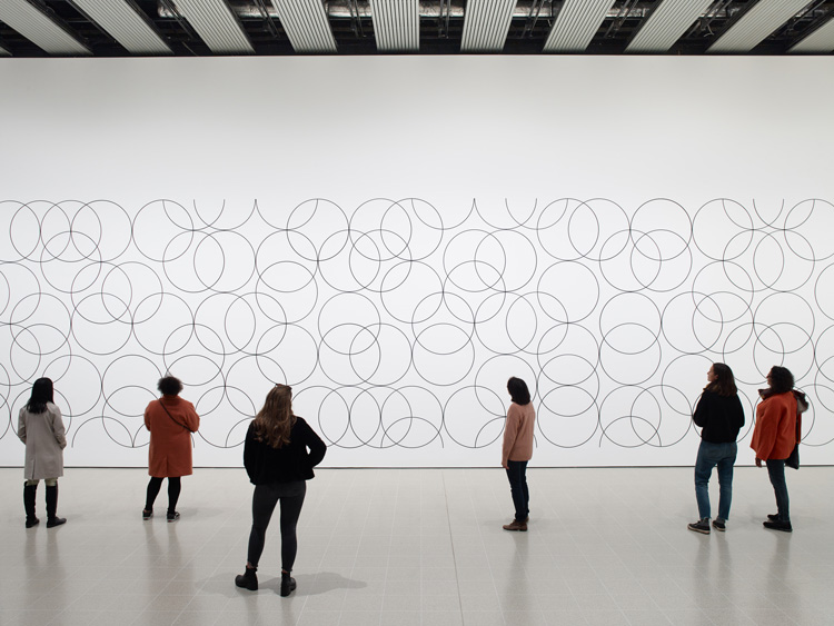 Installation view of Bridget Riley, Composition with Circles 4, 2004 at Hayward Gallery 2019. © Bridget Riley 2019 Photo: Stephen White & Co.