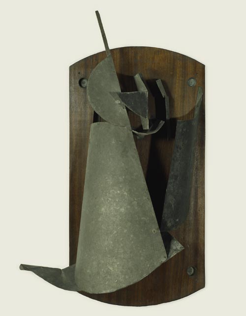 Vladimir Tatlin. <em>Counter-Relief </em>(<em>Material Selection</em>), 1916. Wood, iron, and zinc, 39 3/8 x 25 3/16 x 10 5/8 inches. The State Tretyakov Gallery, Moscow. Photo: © The State Tretyakov Gallery, Moscow.