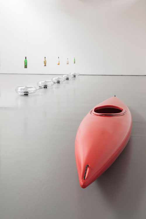 Roman Signer. Bar, 2007 (exhibition copy 2015) and Whisky boat, 2015. Photograph: Ruth Clark, courtesy of Dundee Contemporary Arts.