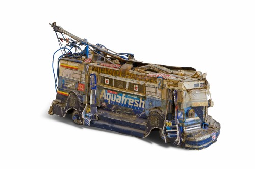Willem van Genk. Untitled (Toblerone Trolley), c1980–2000. Tin cans, cardboard, metal, paint, paper, and plastic, 10 x 19 x 5 1/8 in (25.5 x 48 x 13 cm). Collection Foundation Willem van Genk, Museum Dr Guislain, Ghent. Photograph: Guido Suykens, Ghent.
