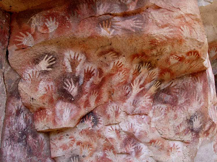 Hand stencil from Cueva de las Manos, Perito Moreno, Argentina, c. 5,000 BCE. Red pigment on stone.
