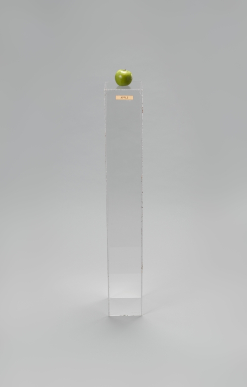 Yoko Ono. Apple, 1966. Plexiglas pedestal, brass plaque, apple, 45 × 6 11/16 × 6 15/16 in (114.3 × 17 × 17.6 cm). Private collection. © Yoko Ono 2014.